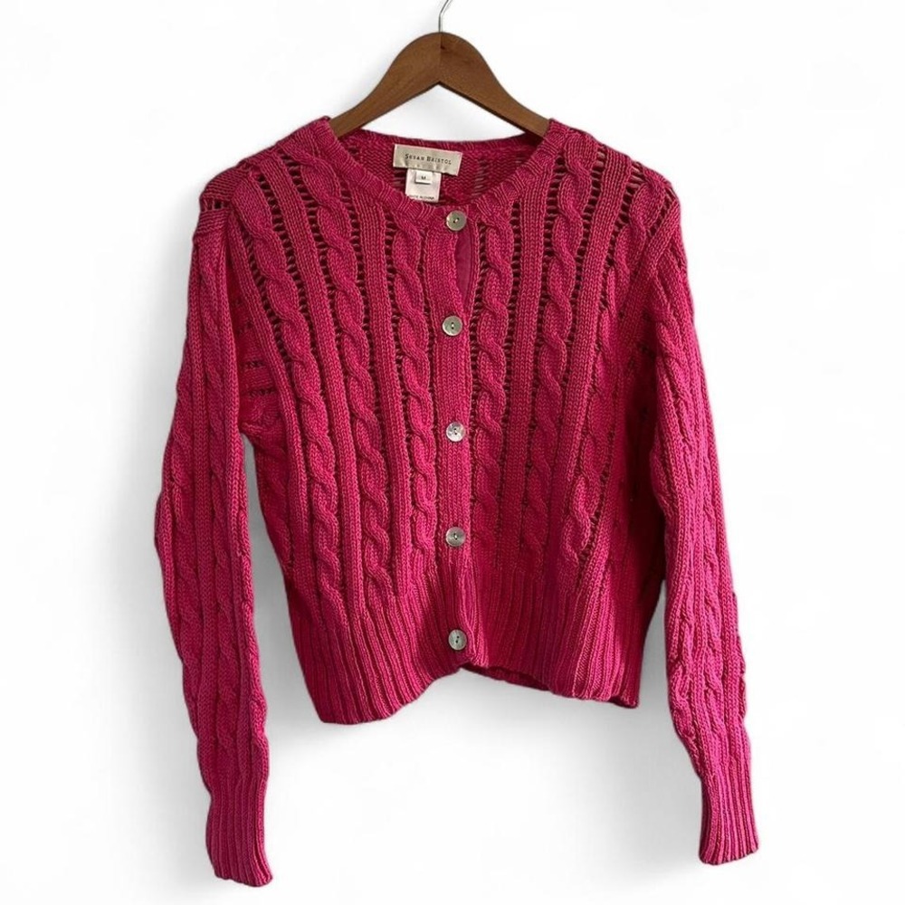 Vintage cable knit pink cardigan with natural shell buttons